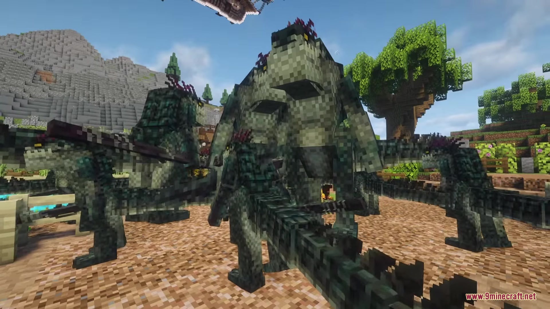 Several green saurian lizard warriors standing together in a grassy field