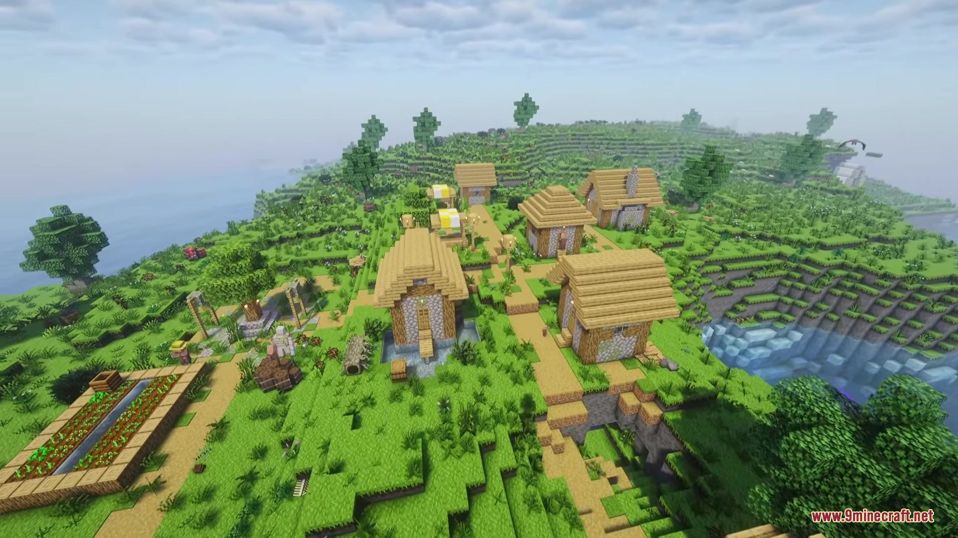 A peaceful village with small wooden houses and paths on a hill