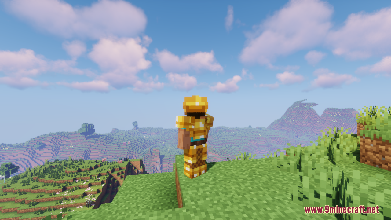 Drodi's Arsenal Resource Pack Screenshot 11 A player wearing golden armor stands on a cliff overlooking a vast landscape