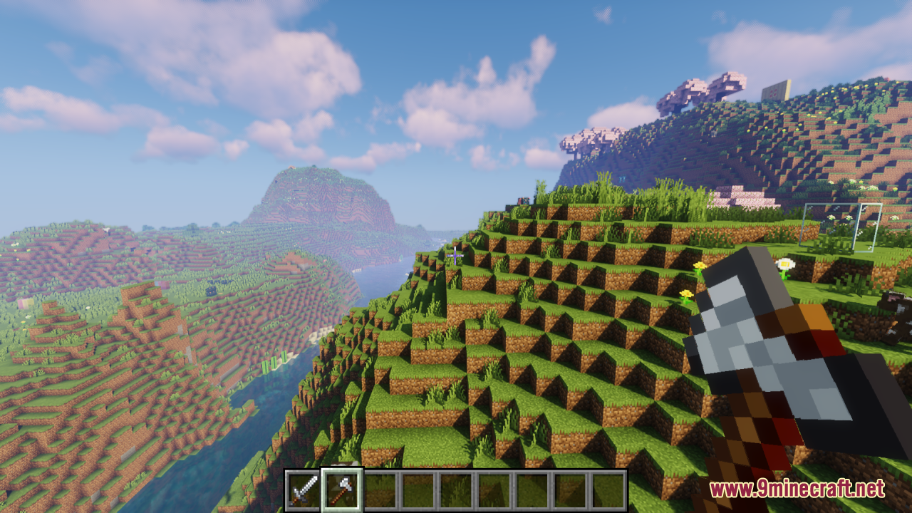 Drodi's Arsenal Resource Pack Screenshot 14 Player holding an iron axe while standing near pink cherry trees in Minecraft