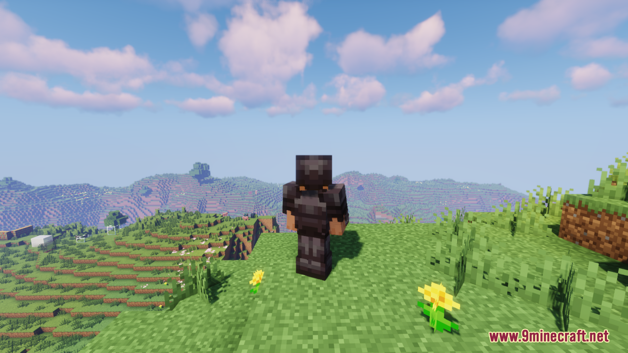 Drodi's Arsenal Resource Pack Screenshot 9 A player wearing heavy netherite armor stands on a cliff overlooking a landscape