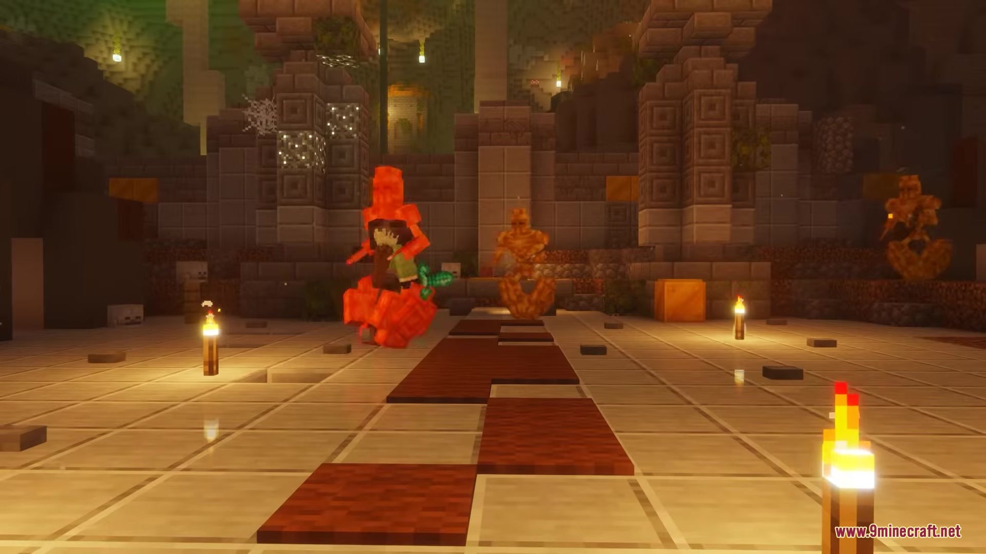 Several orange mechanical robots patrol a large stone chamber with glowing torches