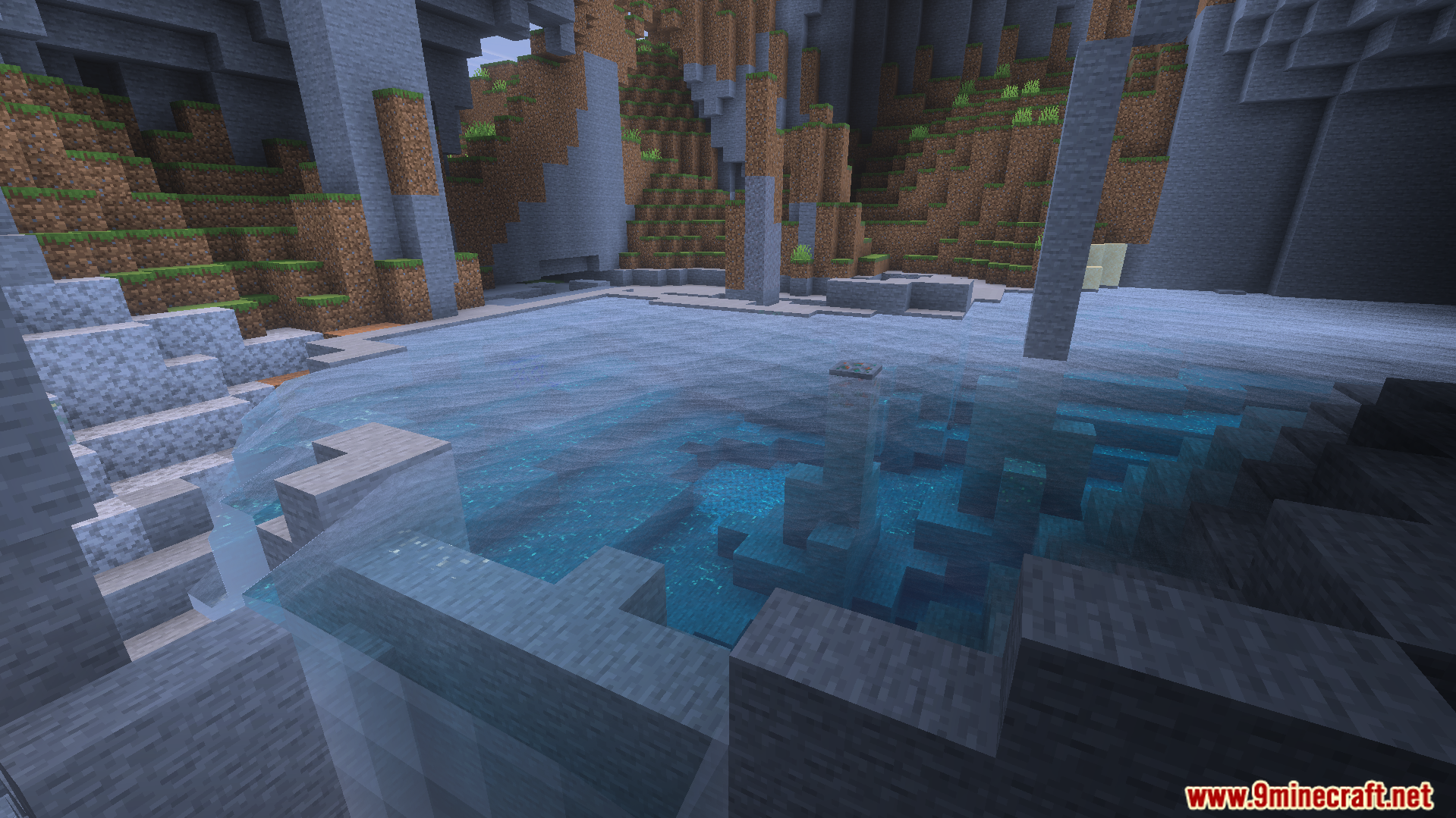 Clear blue water with realistic movements near a waterfall and stone cliffs