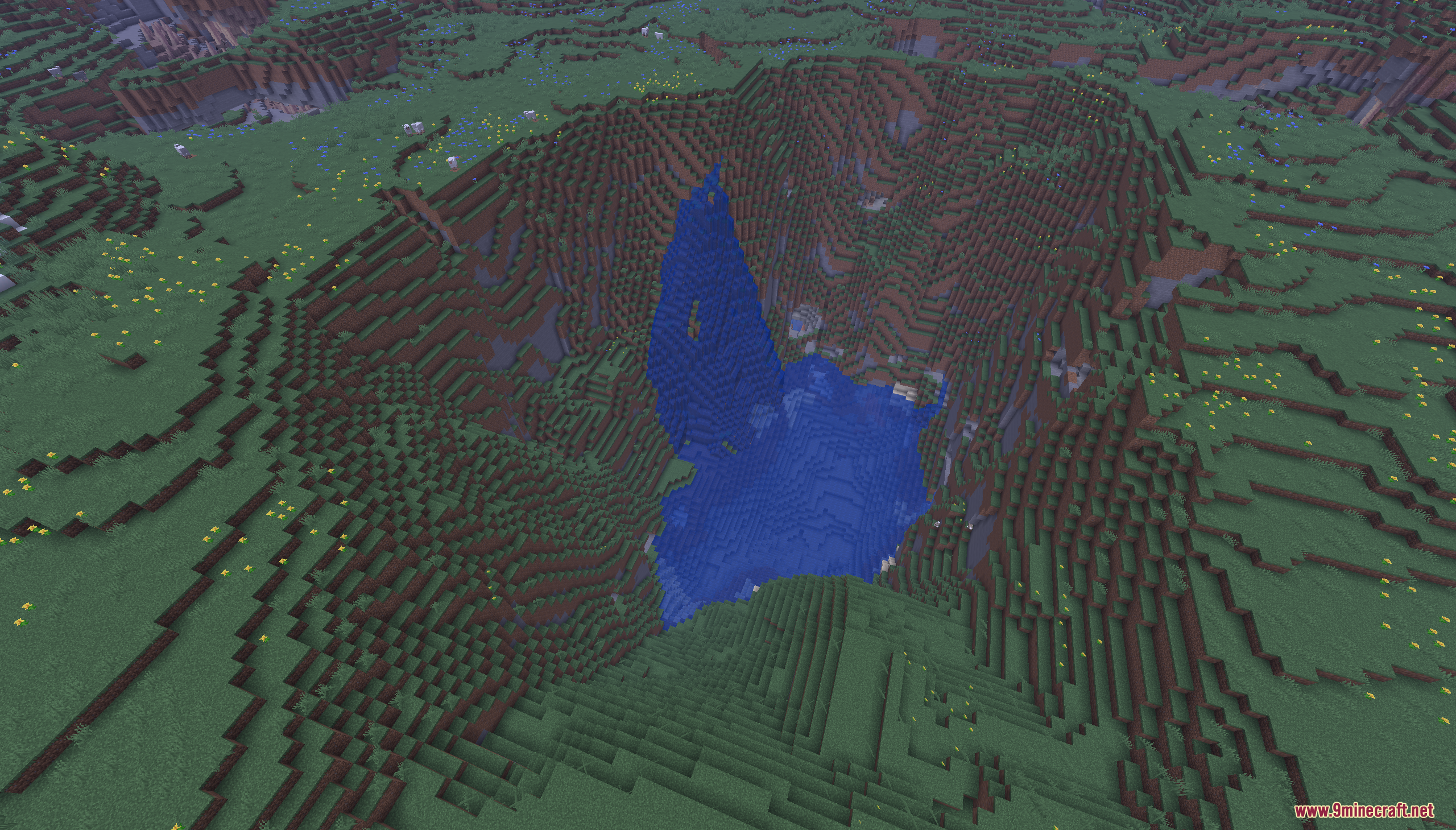 Easy Speed Run Map Screenshot 6 A massive crater in a grassy field featuring a tall central water pillar