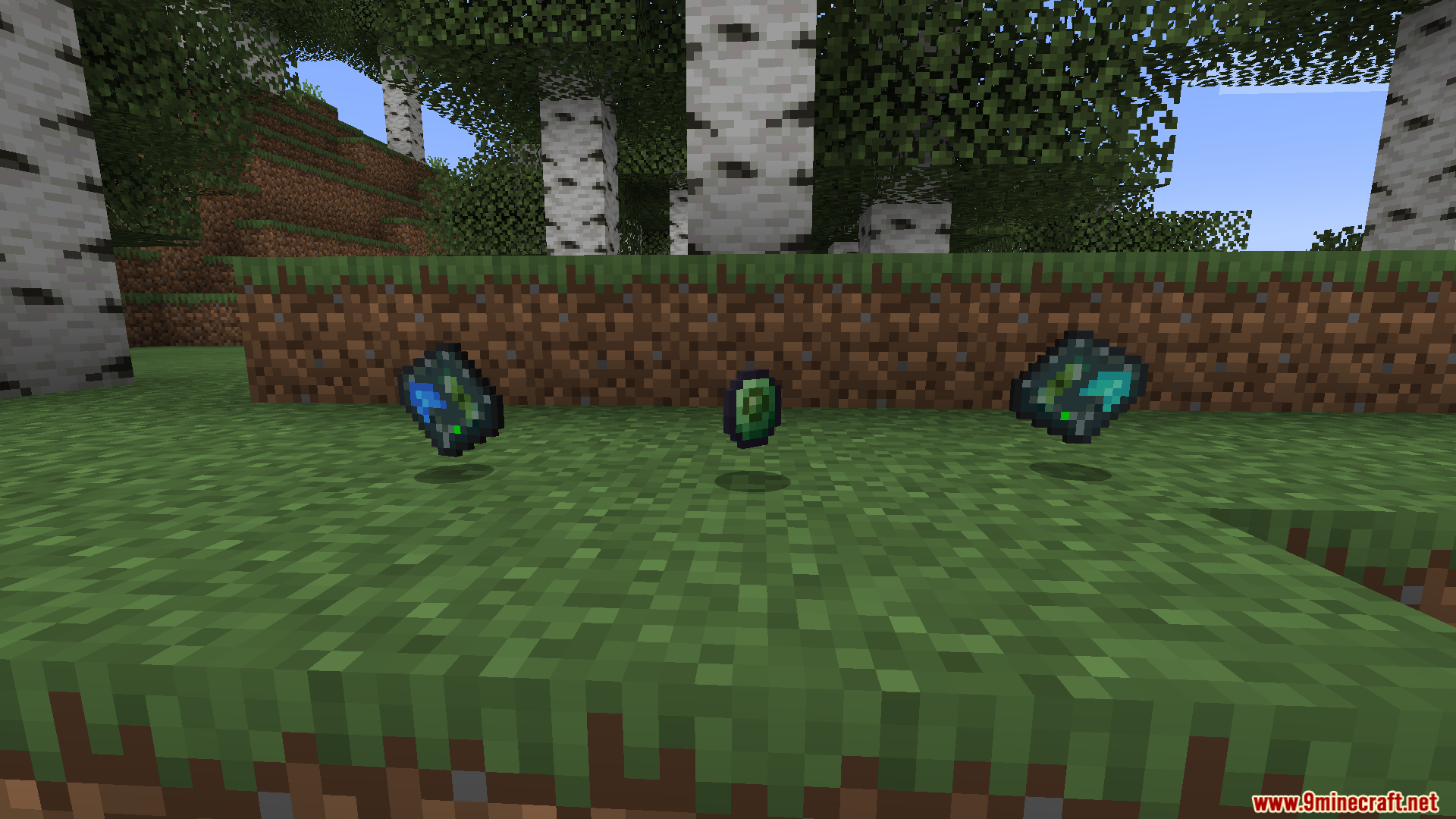 Ender Drives Mod Screenshot 9 Three Ender Drives floating above the grass in a birch forest