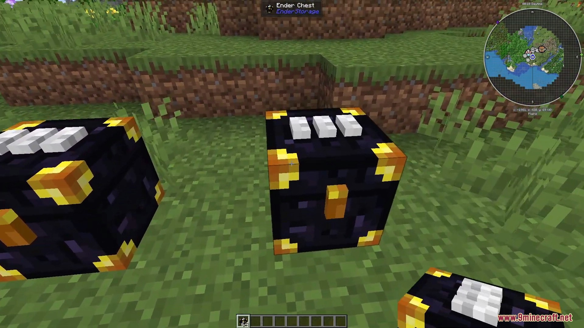 Three color coded Ender Chests placed on a grassy field in Minecraft
