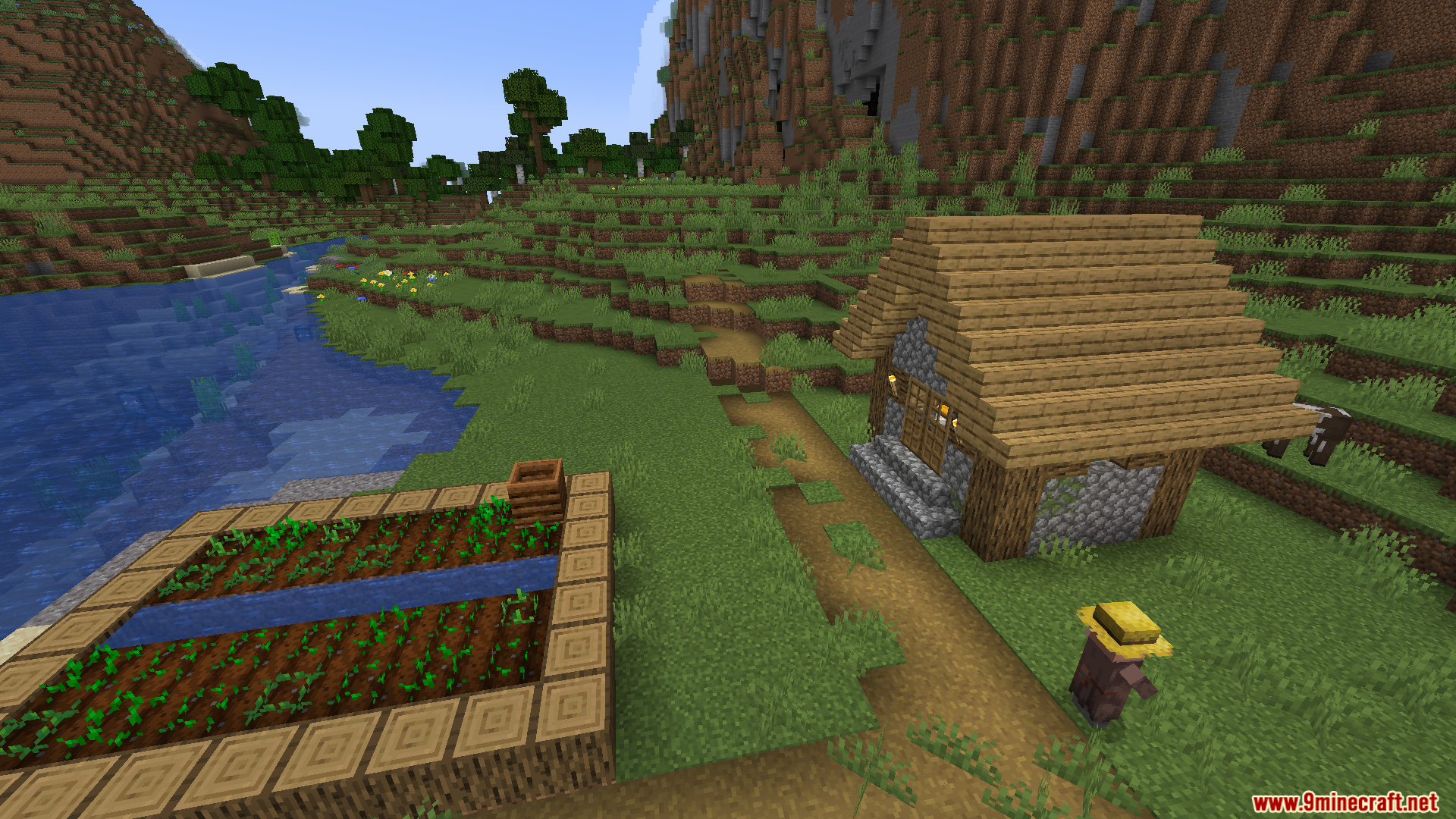 Enough Visuals Mod Screenshot 4 A villager with a straw hat walks past a farm and house