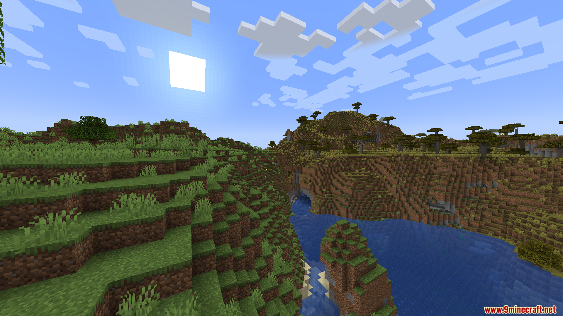 Enough Visuals Mod Screenshot 7 A scenic river valley with grassy hills and savanna trees under the sun