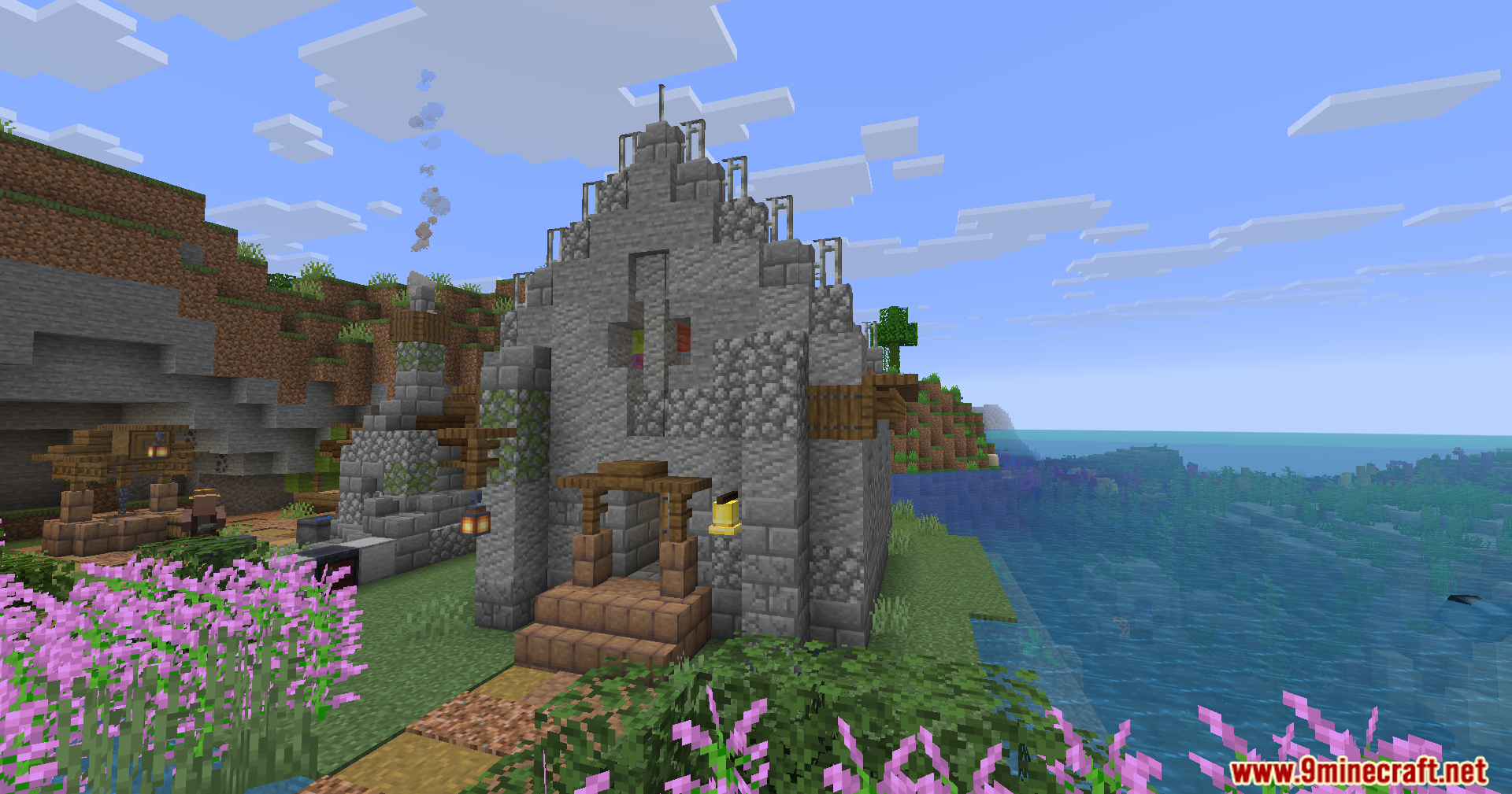 Epic Structures Villages Mod Screenshot 5 Detailed stone church building with a bell located near the ocean shore