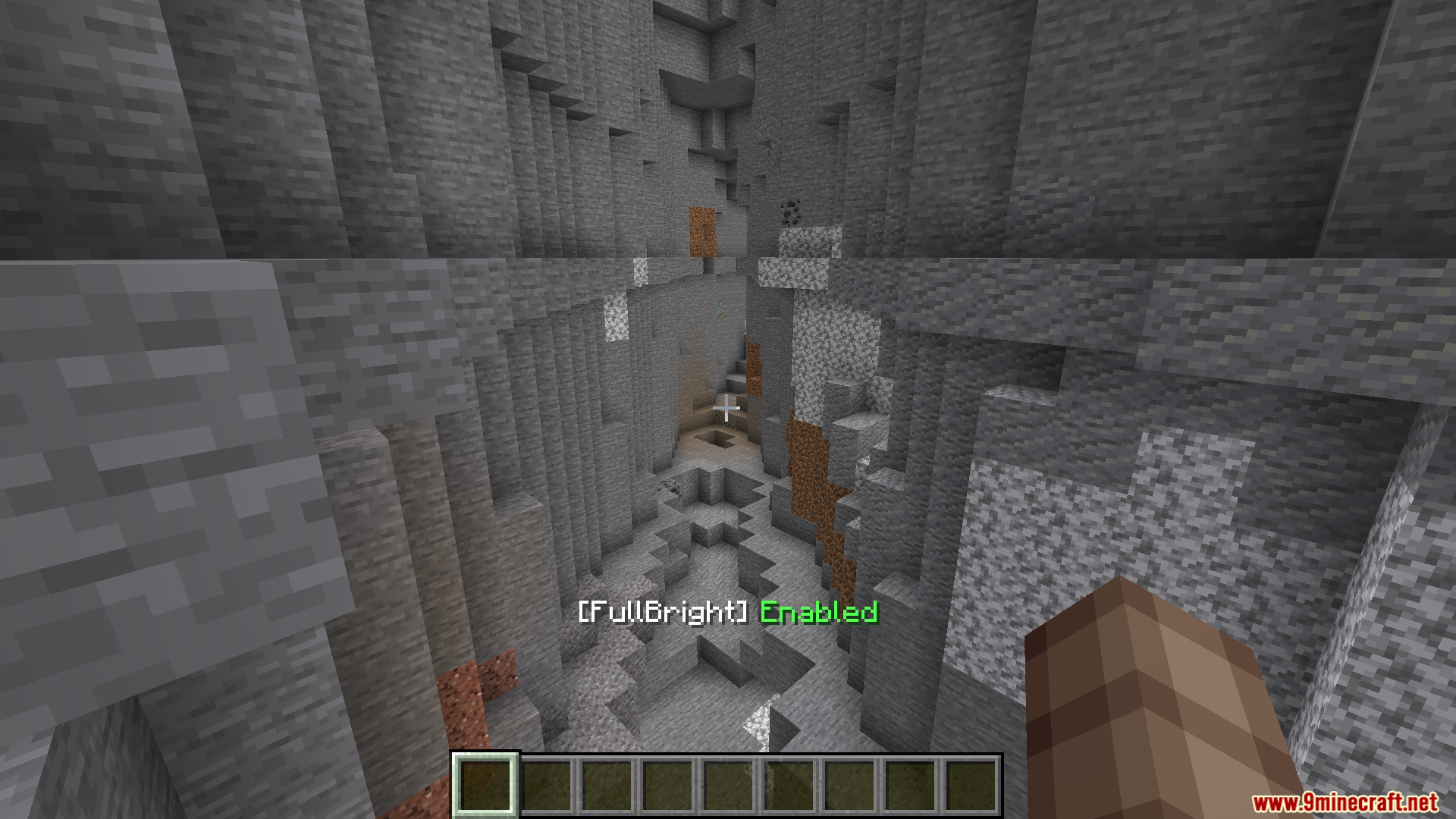 A dark stone cave made visible using the FullBright night vision effect