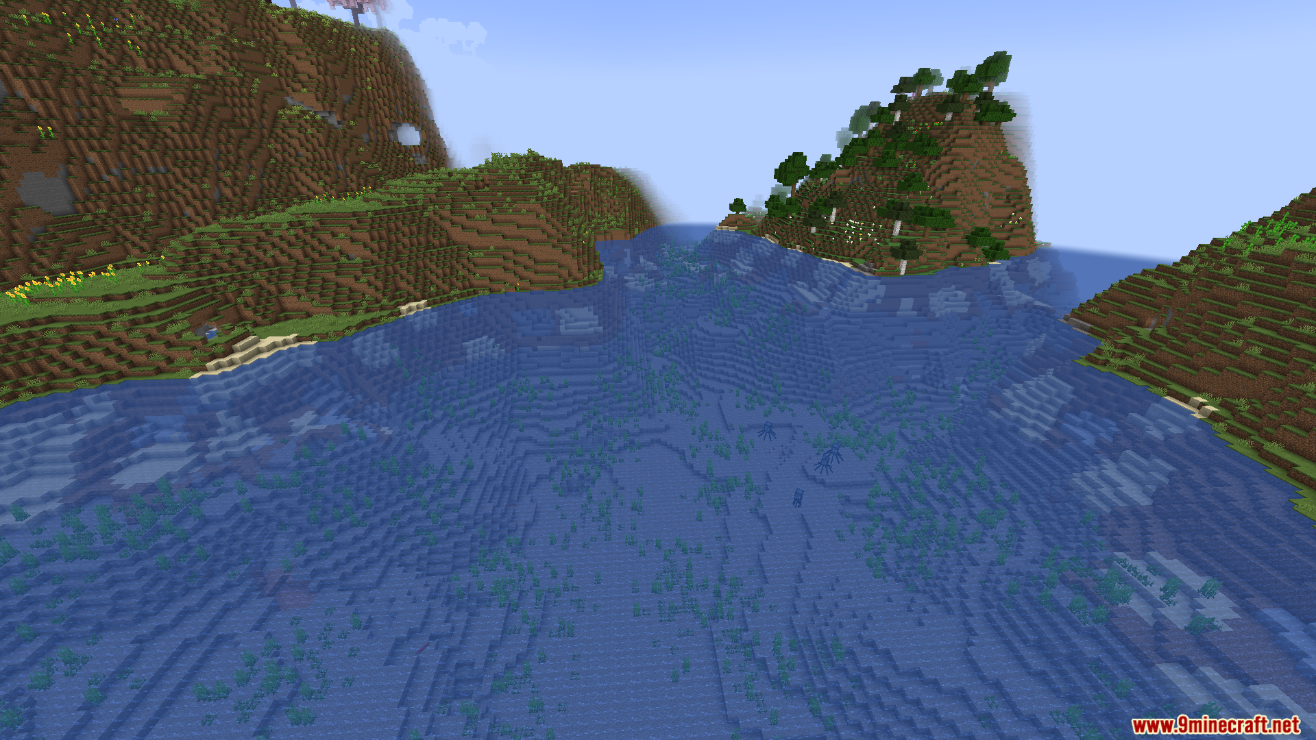Bright Minecraft landscape showing clear water and visible underwater terrain
