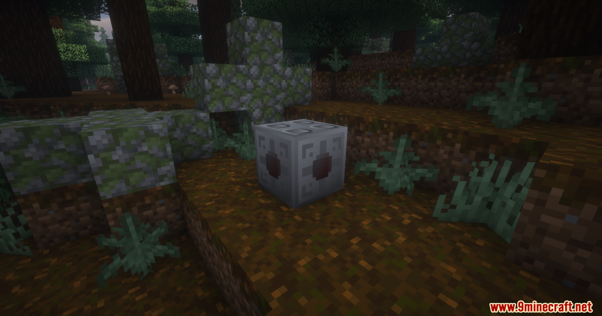 Extended Industrialization Mod Screenshot 8 A single grey industrial machine block placed on the forest ground