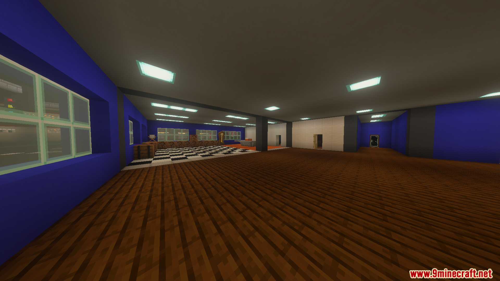 Spacious interior of a Freddy Fazbear Pizzeria with blue walls and checkered floor