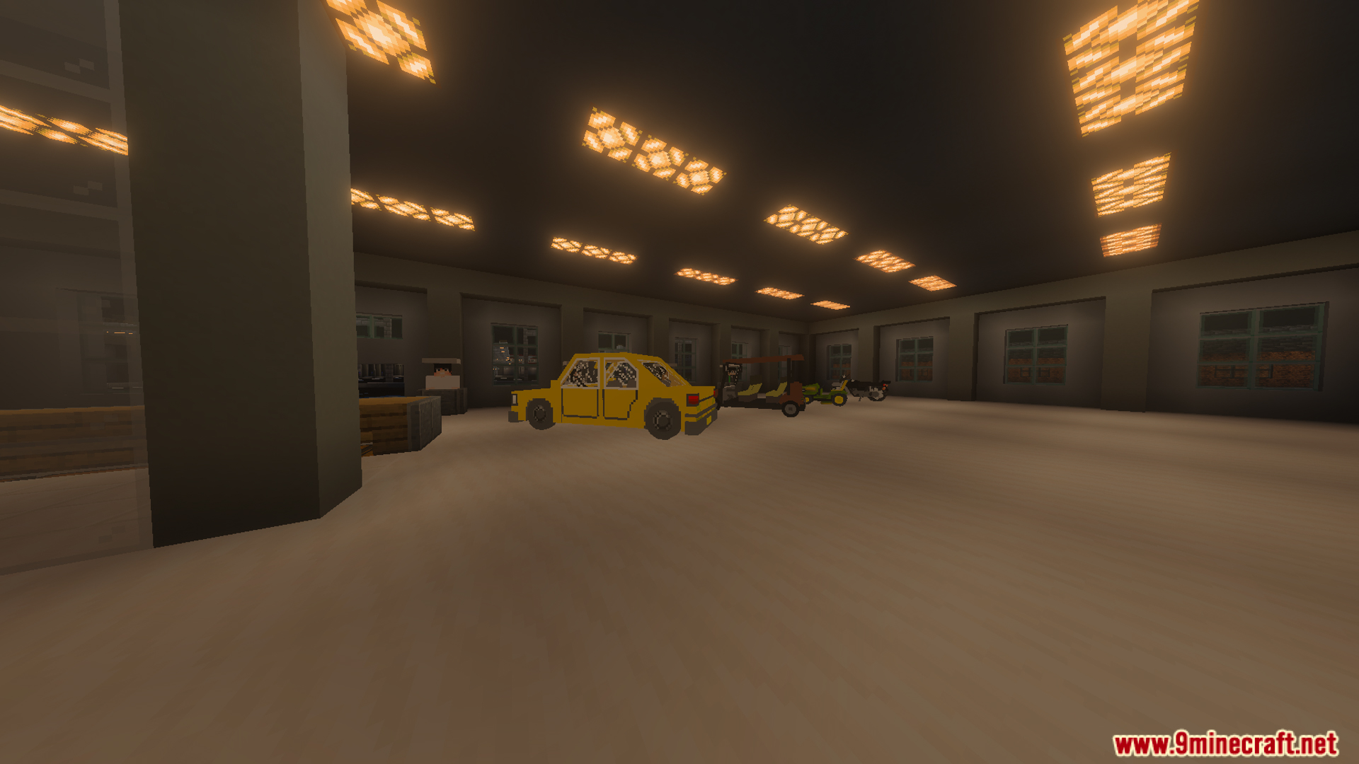 A yellow car and other vehicles parked in a spacious indoor parking area