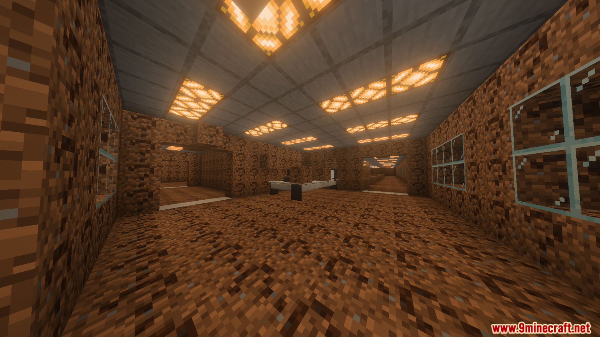 Interior of a building with dirt walls and glowing lights on the ceiling