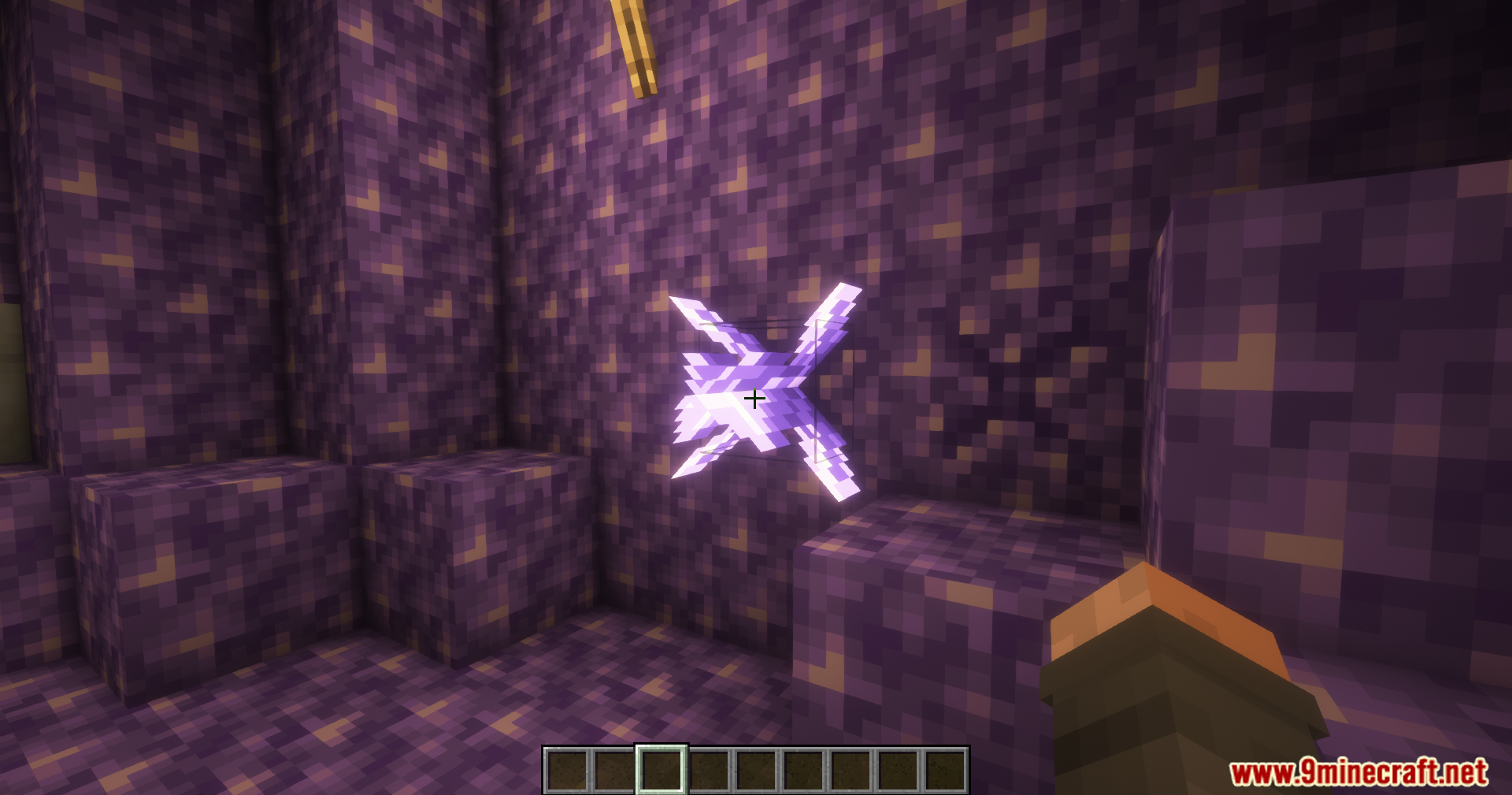 A player looking at a fully grown amethyst cluster inside a geode
