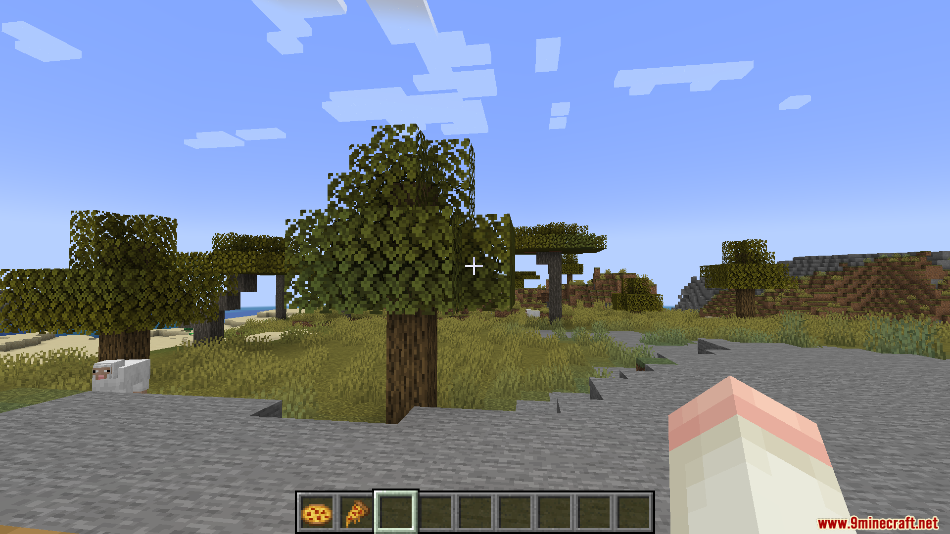 Farmers Pizzeria Mod Screenshot 13 A player holding a pizza slice while exploring a sunny savanna biome