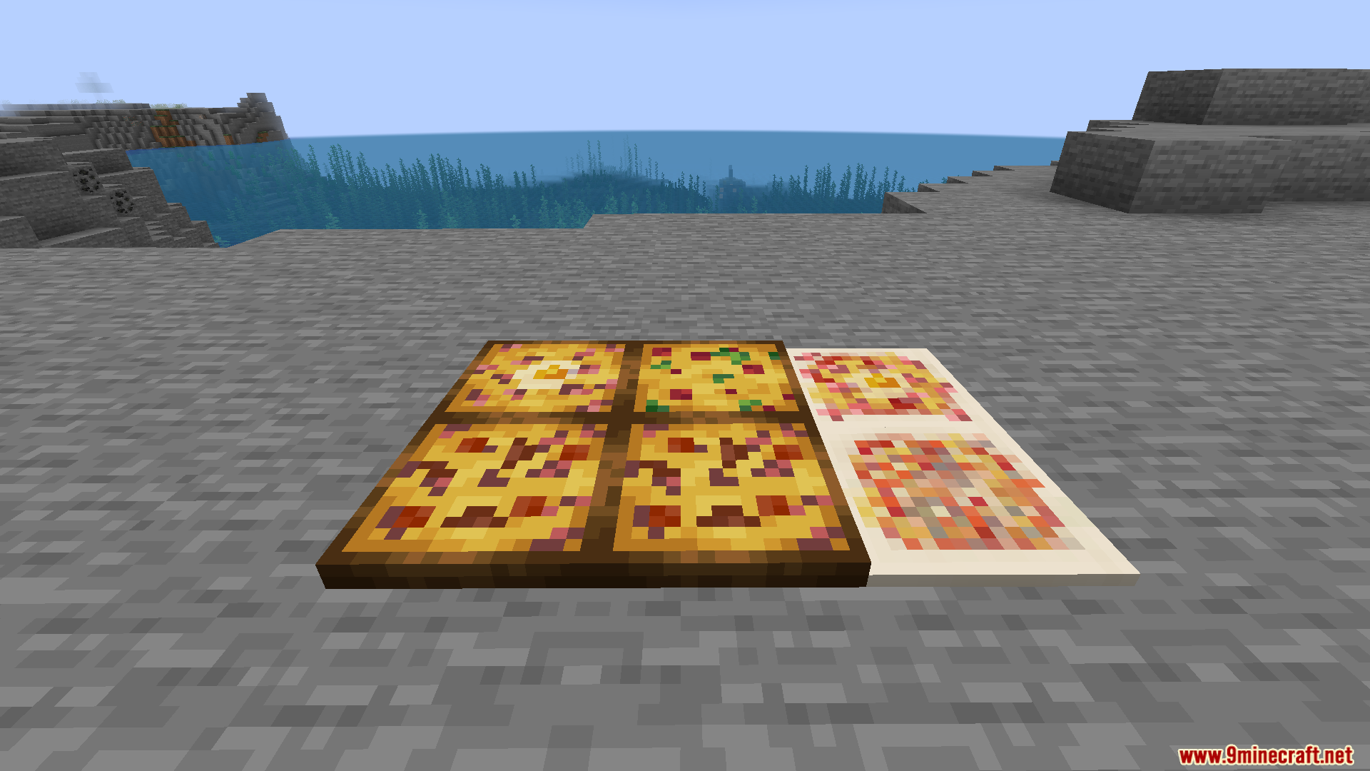 Farmers Pizzeria Mod Screenshot 6 Multiple whole pizzas with different toppings placed on the ground in Minecraft