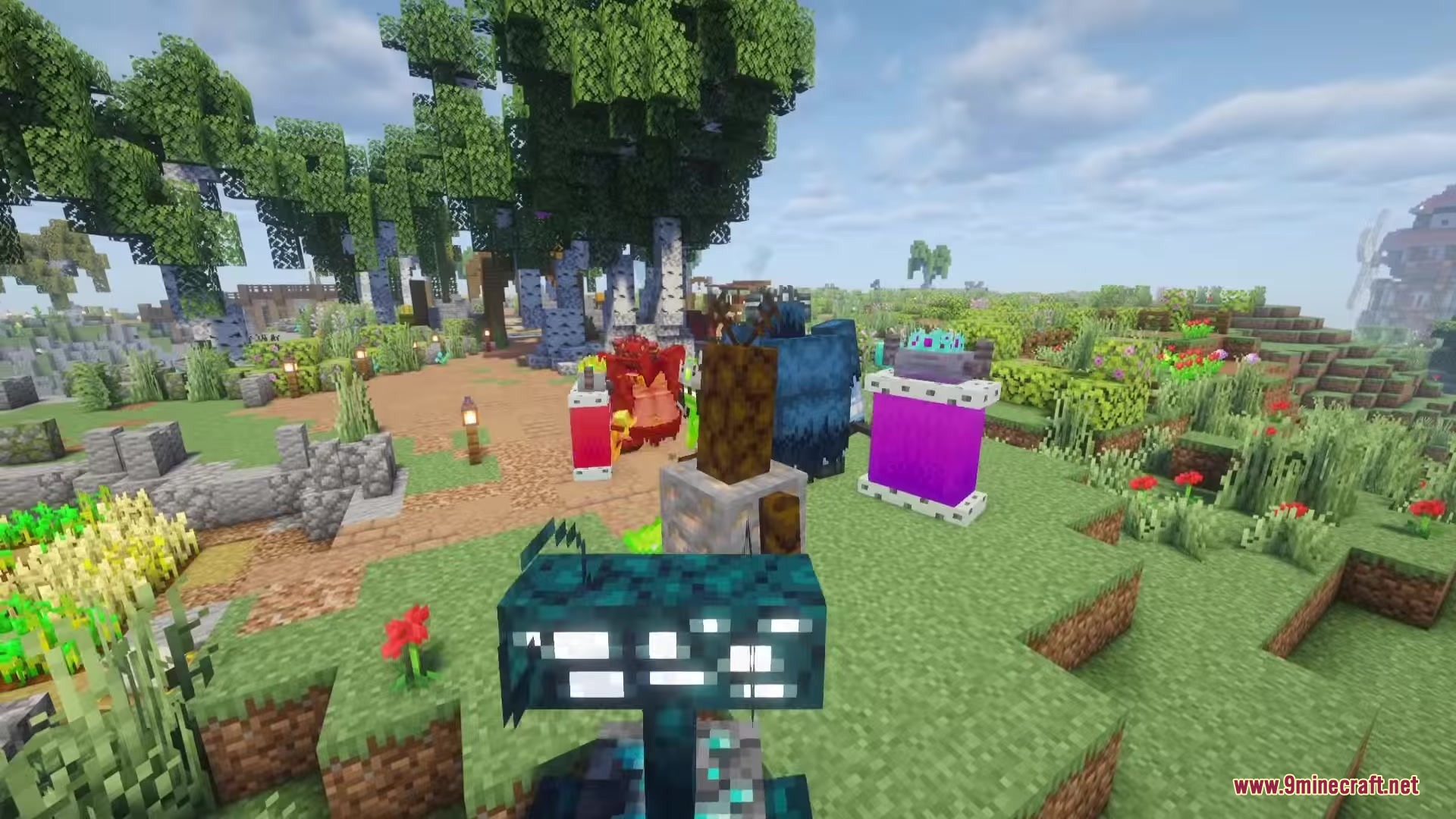 Fights Frights Mod Screenshot 2 Several spooky monsters and custom blocks are displayed in a grassy field