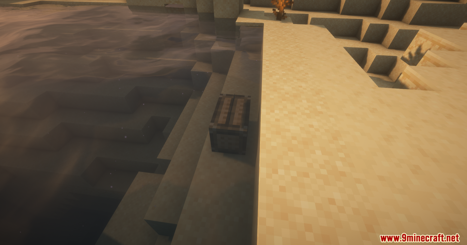 Fishermen's Trap Mod Screenshot 4 The wooden fish trap block is placed underwater near a sandy shoreline