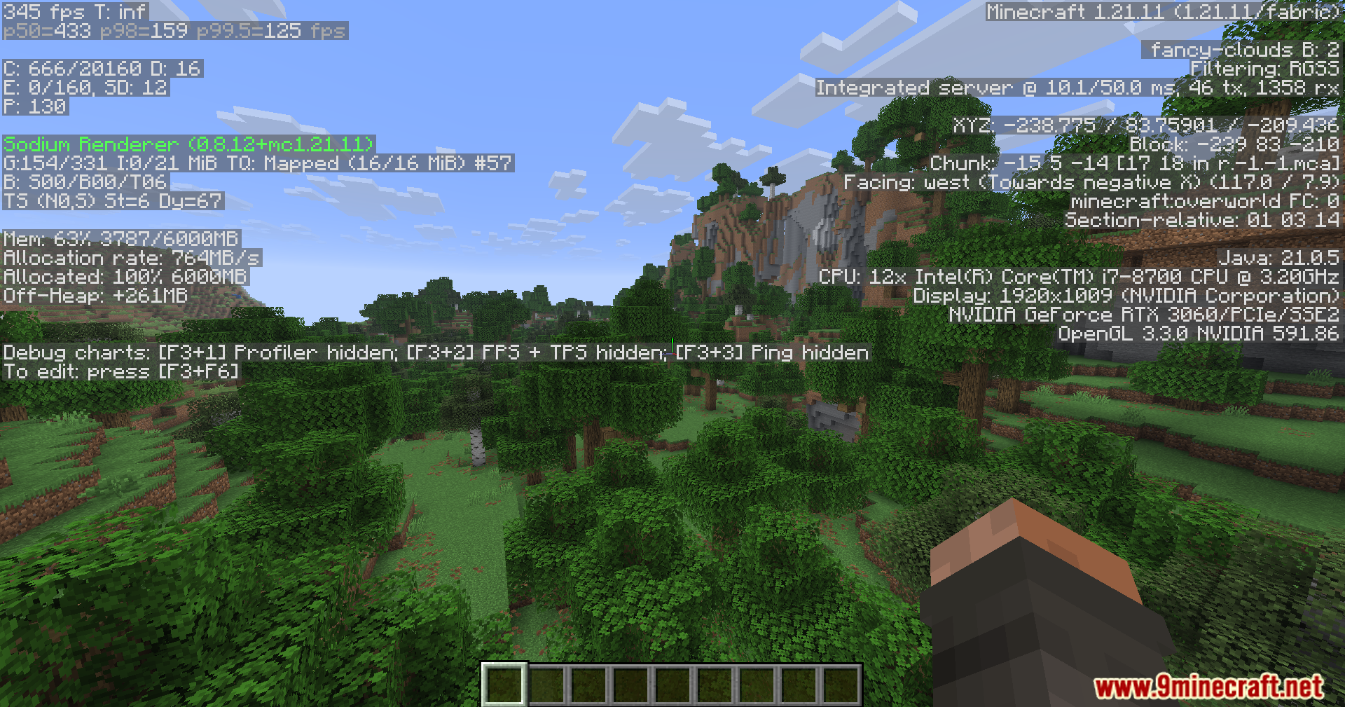 Minecraft landscape with F3 debug menu displaying frame rate and hardware