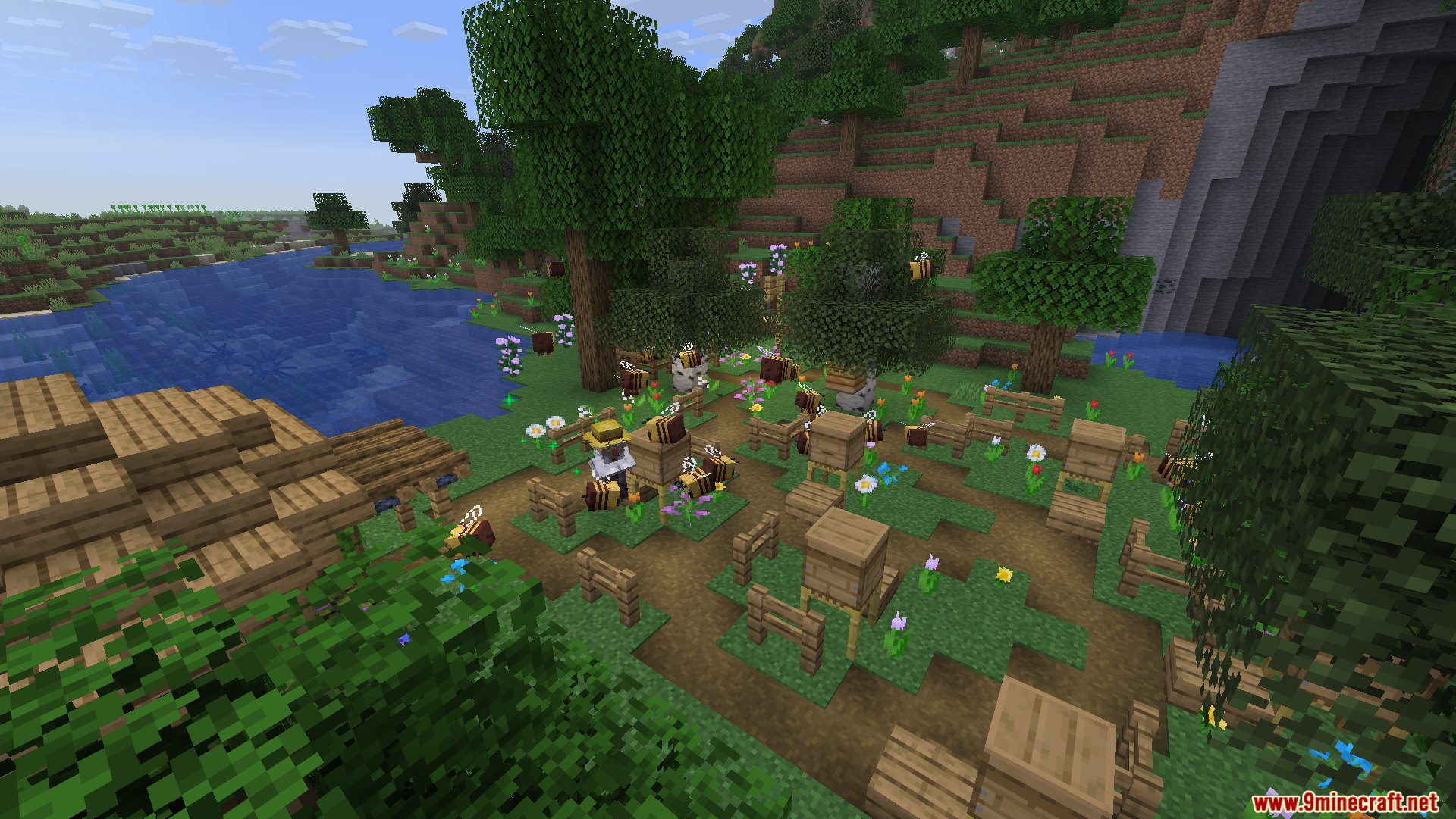 Friends N Foes Beekeeper Hut Mod Screenshot 1 Beekeeper villager tending to hives near a hut in the Friends N Foes mod