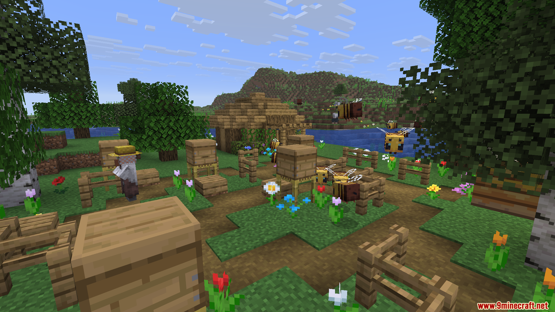 Friends N Foes Beekeeper Hut Mod Screenshot 2 Bees fly around wooden hives and flowers near a custom beekeeper hut structure