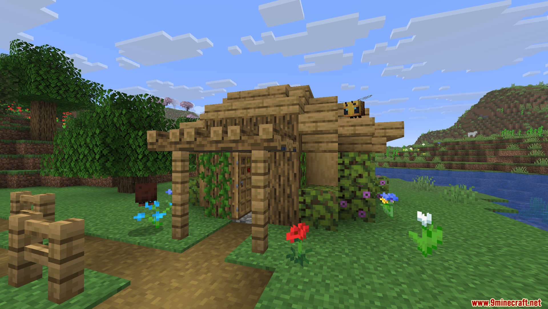 Friends N Foes Beekeeper Hut Mod Screenshot 5 A Friends N Foes Beekeeper Hut structure located in a flower forest