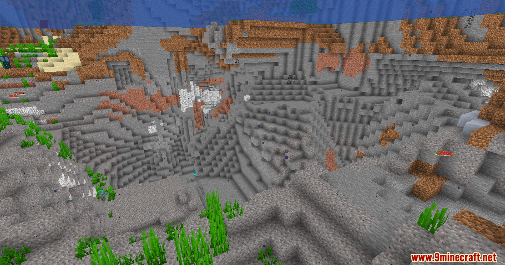 A bright underwater ravine showing various stone and dirt blocks without shadows