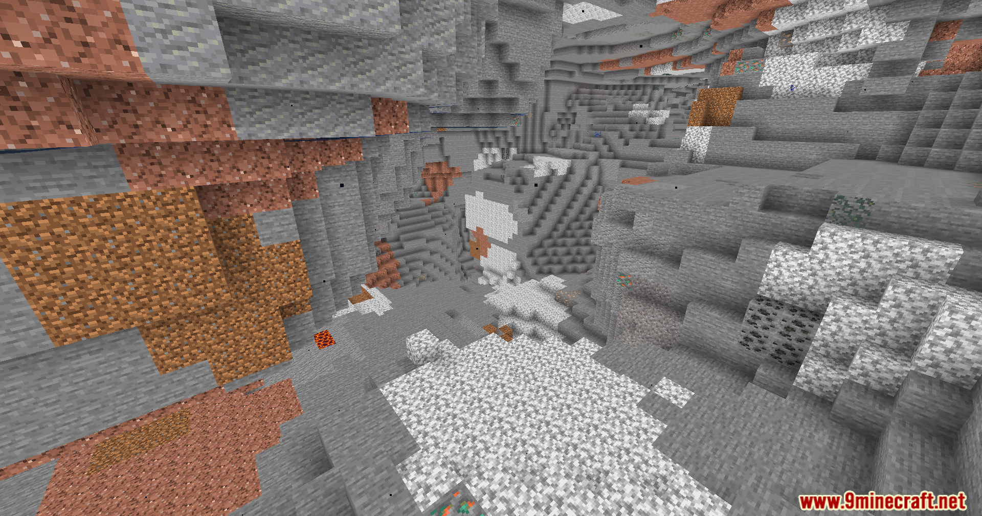 Brightly lit underground cave system featuring various stone types and mineral ores