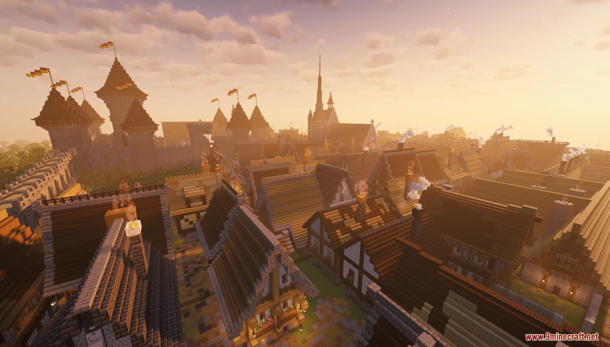 Sunset view over the rooftops of a medieval town with castle towers