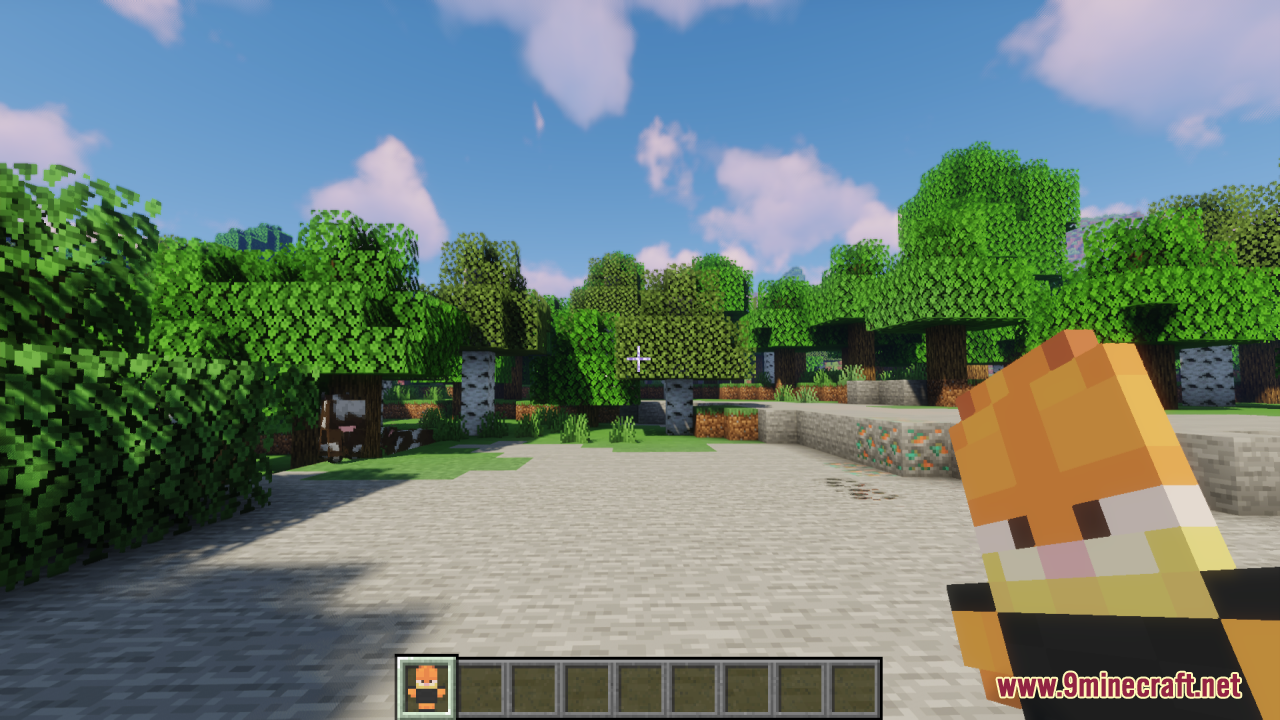 First person view of a player holding a Garfield totem in the woods