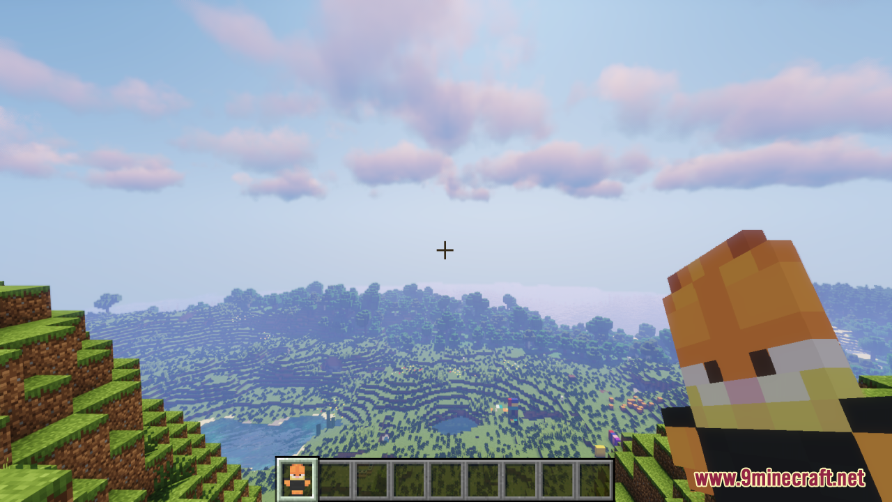 Player holding a Garfield totem of undying while looking at the landscape