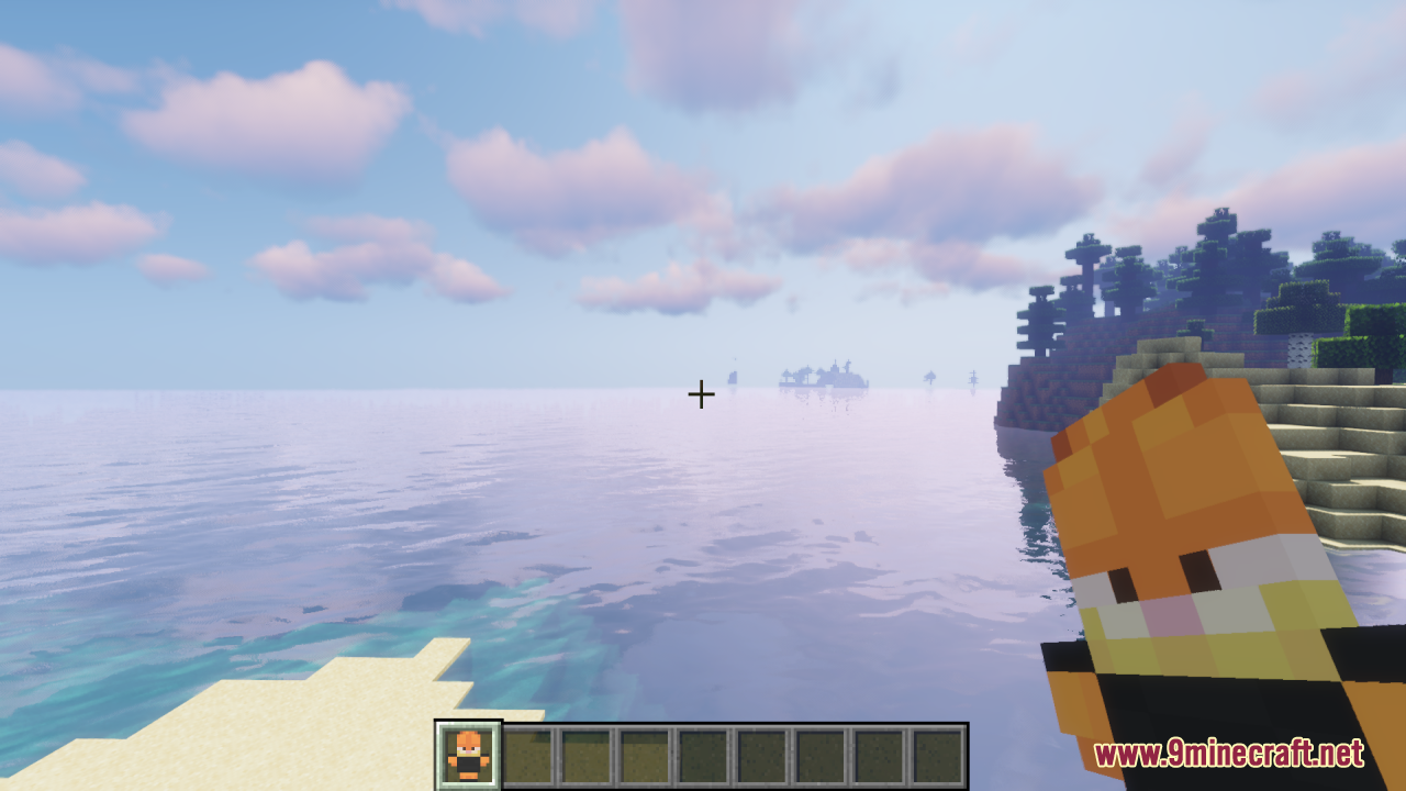 A player holds a Garfield totem of undying near a scenic ocean view