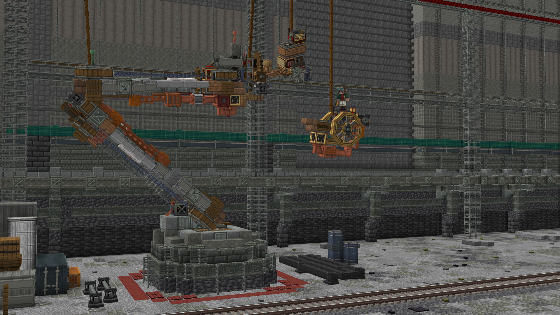 A mechanical arm assembly standing on a stone base inside an industrial hangar