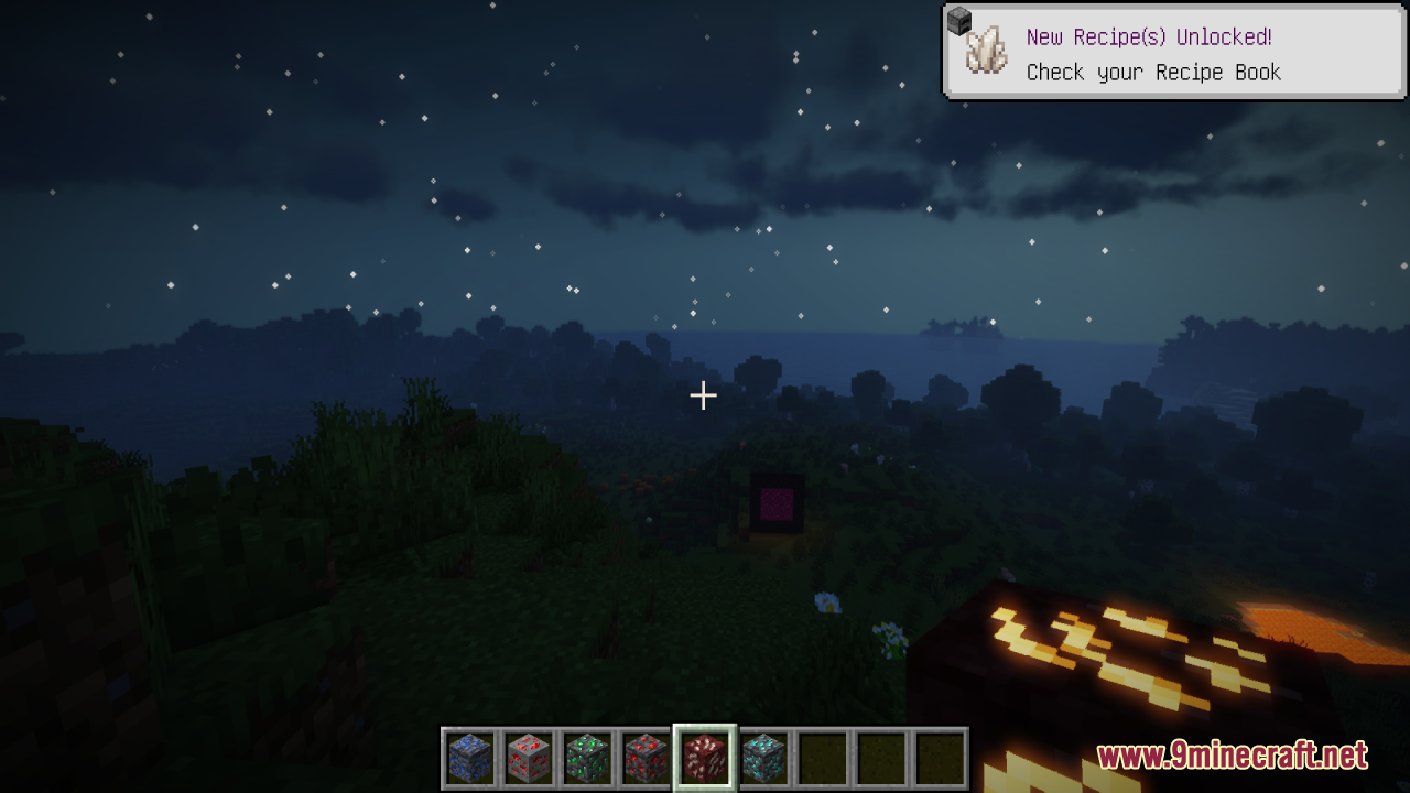 The hotbar displays several glowing ore blocks under a starry night sky