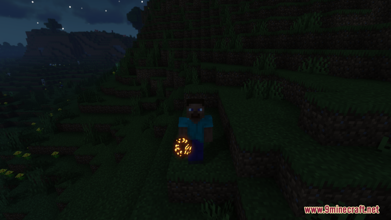 Steve holds a glowing ore item while standing in a dark landscape