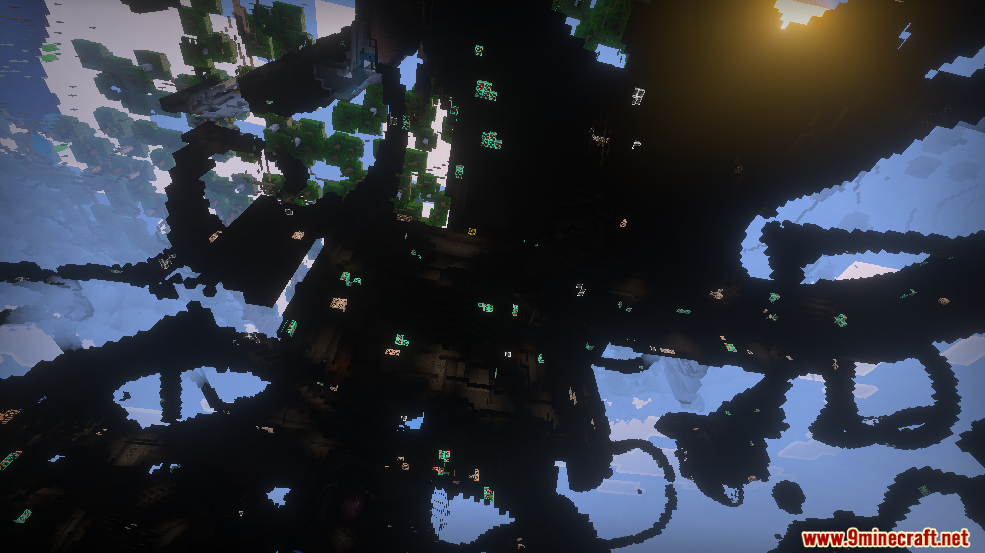 Wide view of underground cave systems with many glowing ore blocks visible