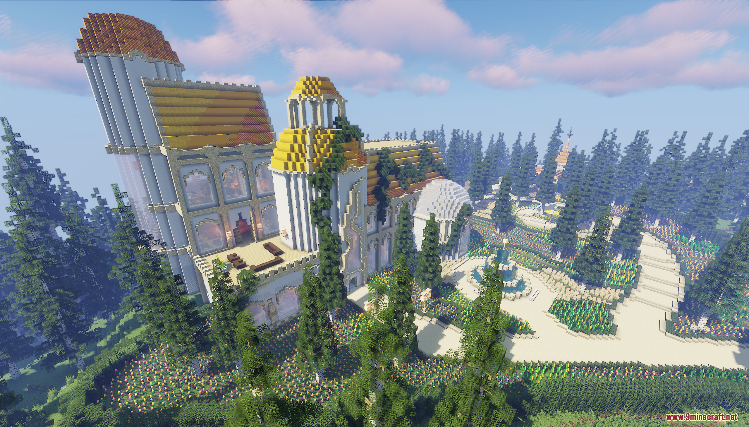Birds eye view of the grand estate with winding paths and vibrant flower gardens