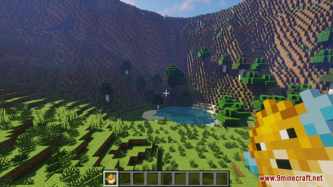 The pufferfish item displays blinking and movement animations in a scenic mountain valley