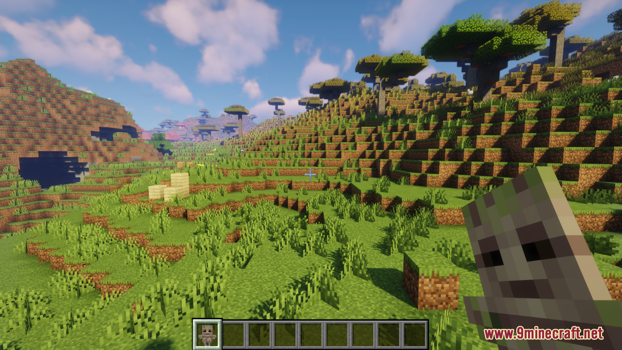 Groot Totem of Undying Resource Pack Screenshot 2 A player holds a wooden tree creature totem while exploring a savanna biome