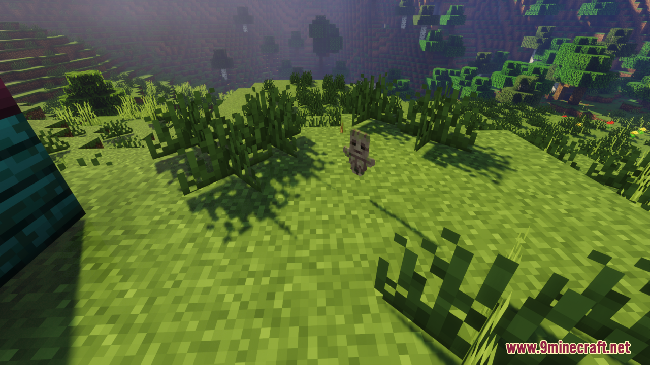 Groot Totem of Undying Resource Pack Screenshot 3 A small wooden totem character stands on the grass in a sunny forest