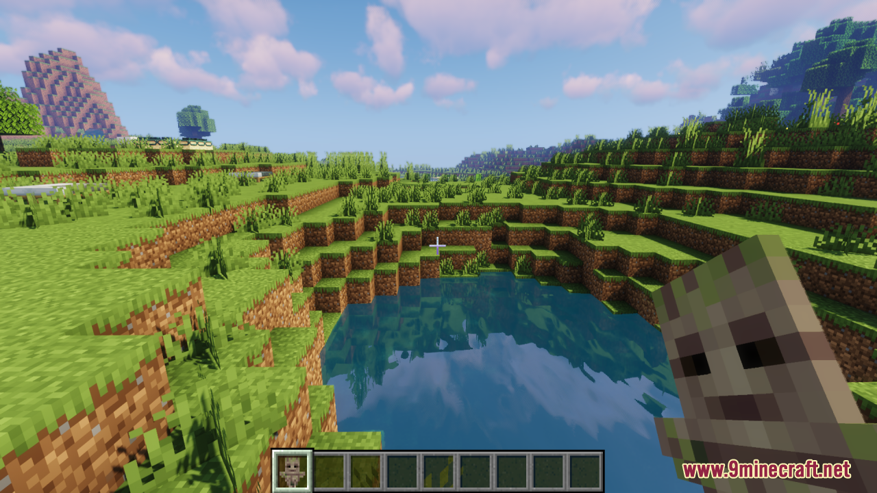 Groot Totem of Undying Resource Pack Screenshot 7 The player holds a Groot totem item while looking at a scenic pond