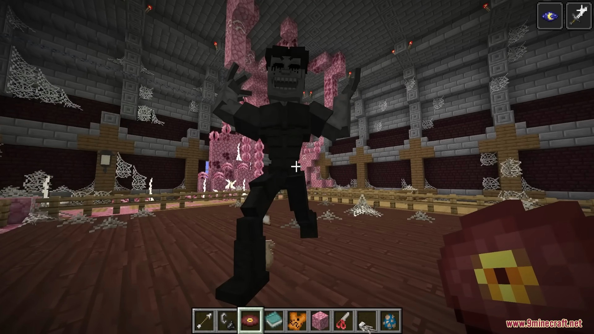The Worm entity emerging from the dark soil at night.