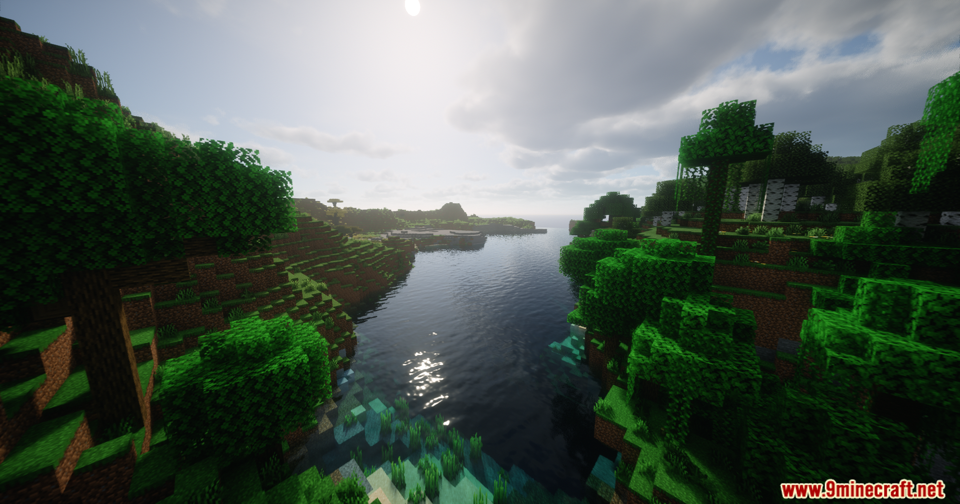 Helian MMCO Sundial Lite Edit Shaders Screenshot 6 Realistic water reflections in a Minecraft river surrounded by dense green forest trees