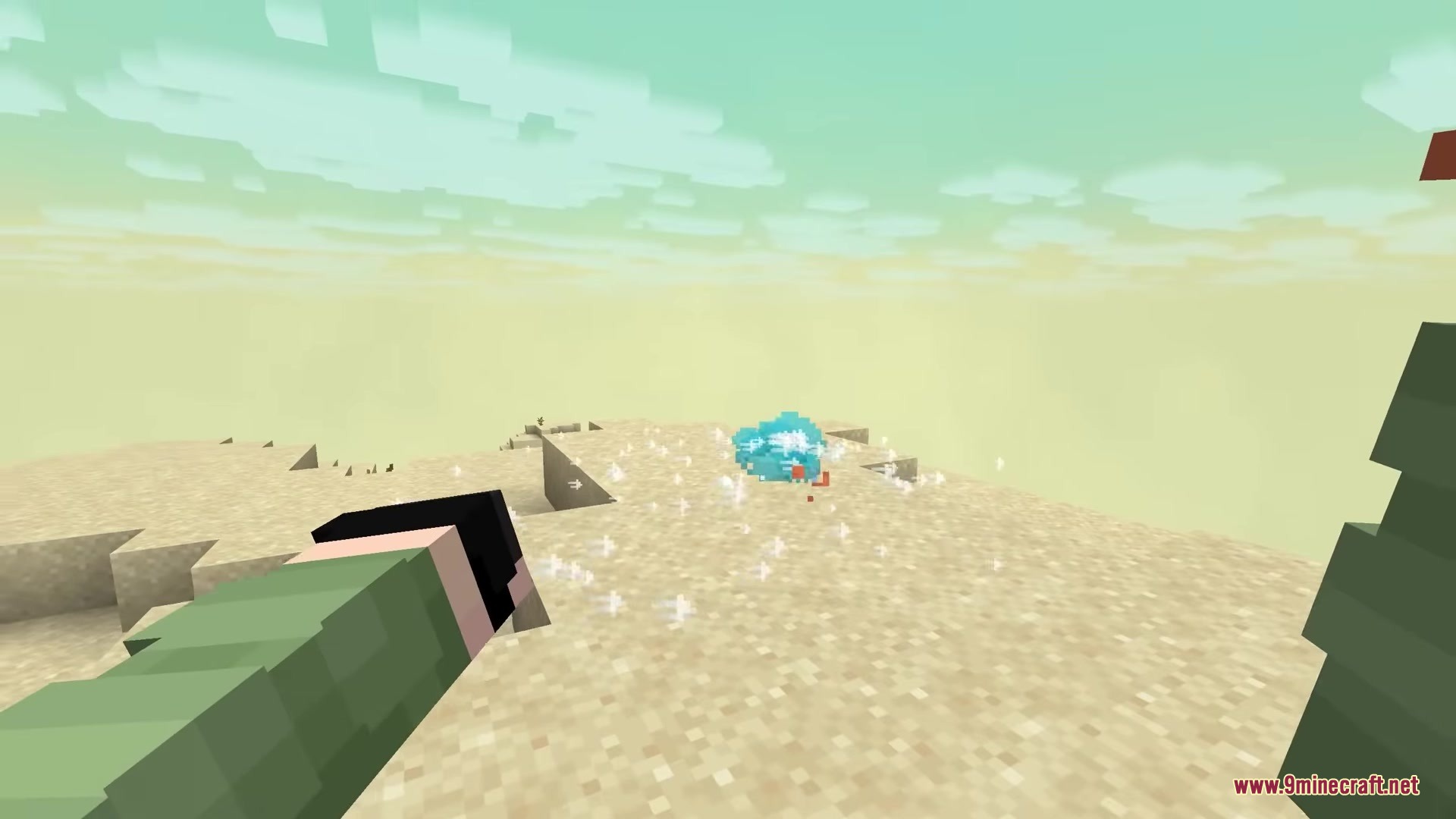 A player throws an item with a realistic hand animation in the desert