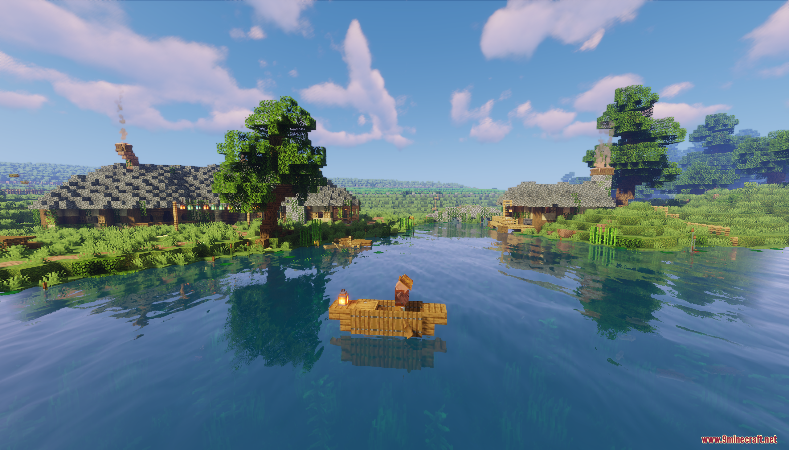 A player rows a small wooden boat on a calm lake near Hobbiton houses