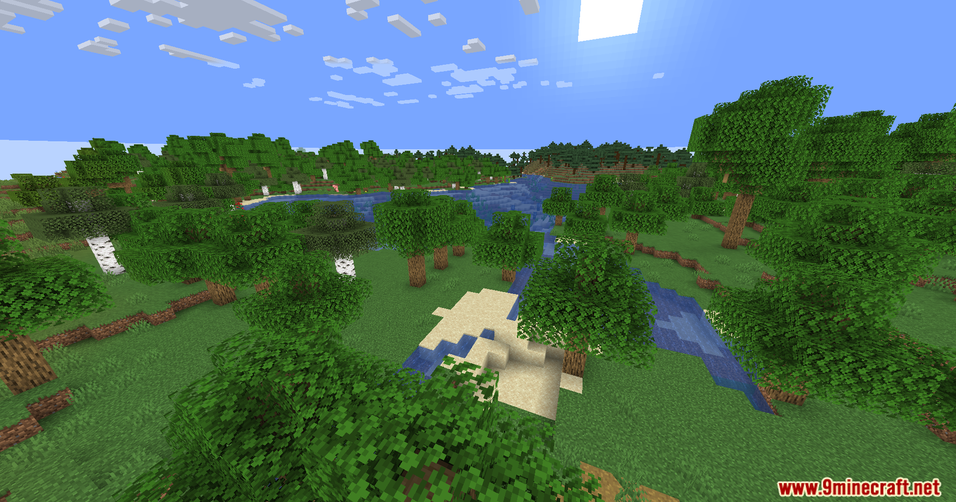 An aerial view of a lush forest and a river in a Minecraft world