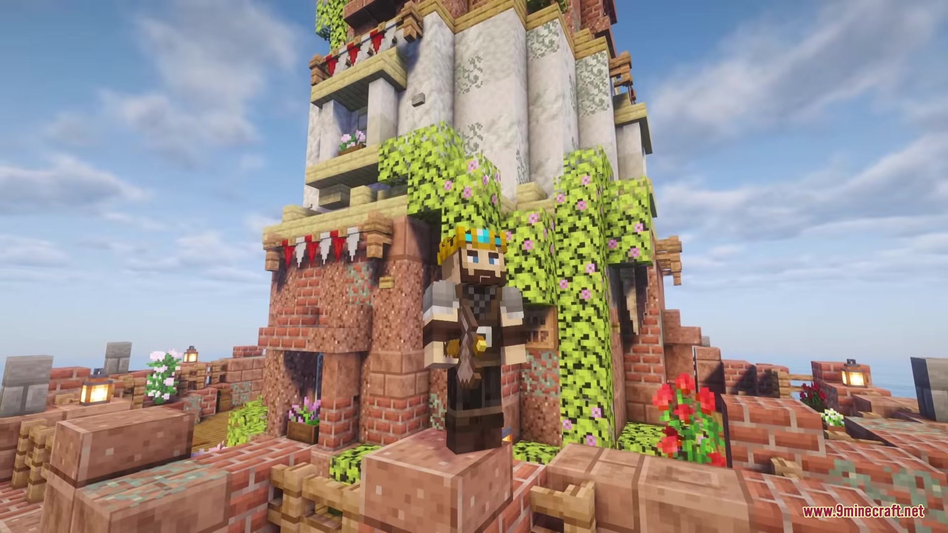 A player character wearing a crown stands on a brick balcony near flowers