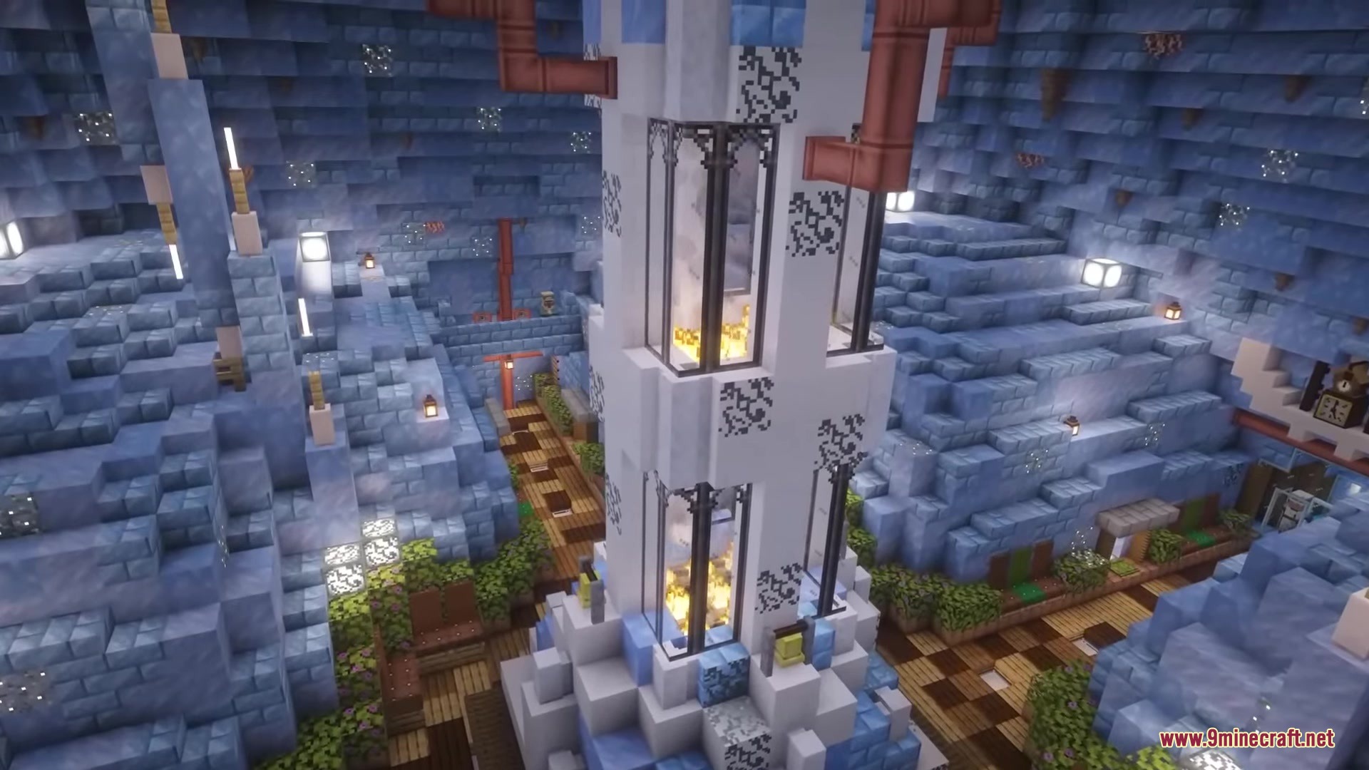 A massive frozen cavern featuring a tall white tower with glowing interior lights